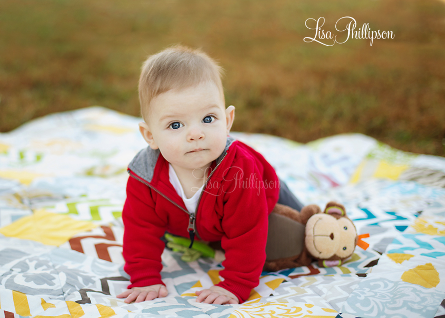 baby boy outside red